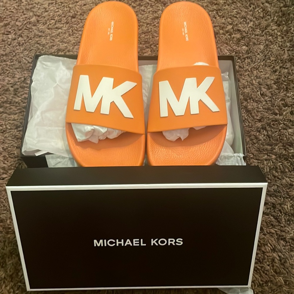 Pair of MICHALE KORS slides